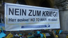 Banner "Nein zum Krieg! No to War!" Vor dem Saal des Westfälischen Friedens