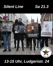 4 Aktivis halten Plakate mit veganen Botschaften.