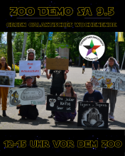 Aktivis stehen vor dem Zoo mit Demoschildern. Werbeplakat für Demo gegen den Zoo, anlässlich Star Wars Event im Zoo. Samstag 9. Mai, 12-15 Uhr vor dem Zoo